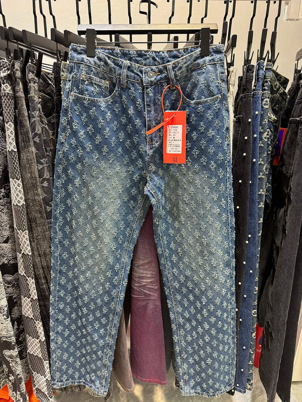 Men's Jacquard Denim Pants: Straight-fit, baggy, distressed wide jeans with intricate pattern.